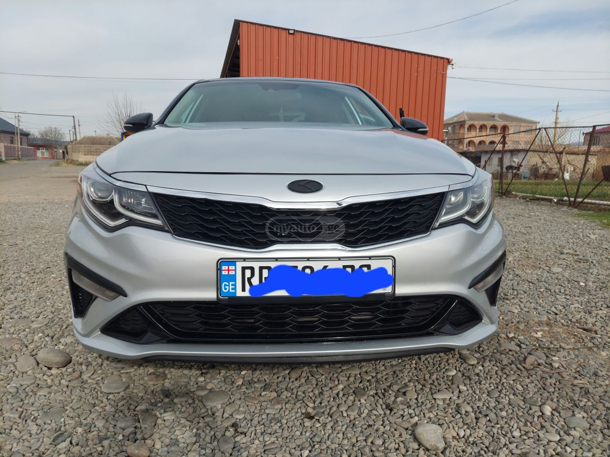 Kia Optima - фото 1