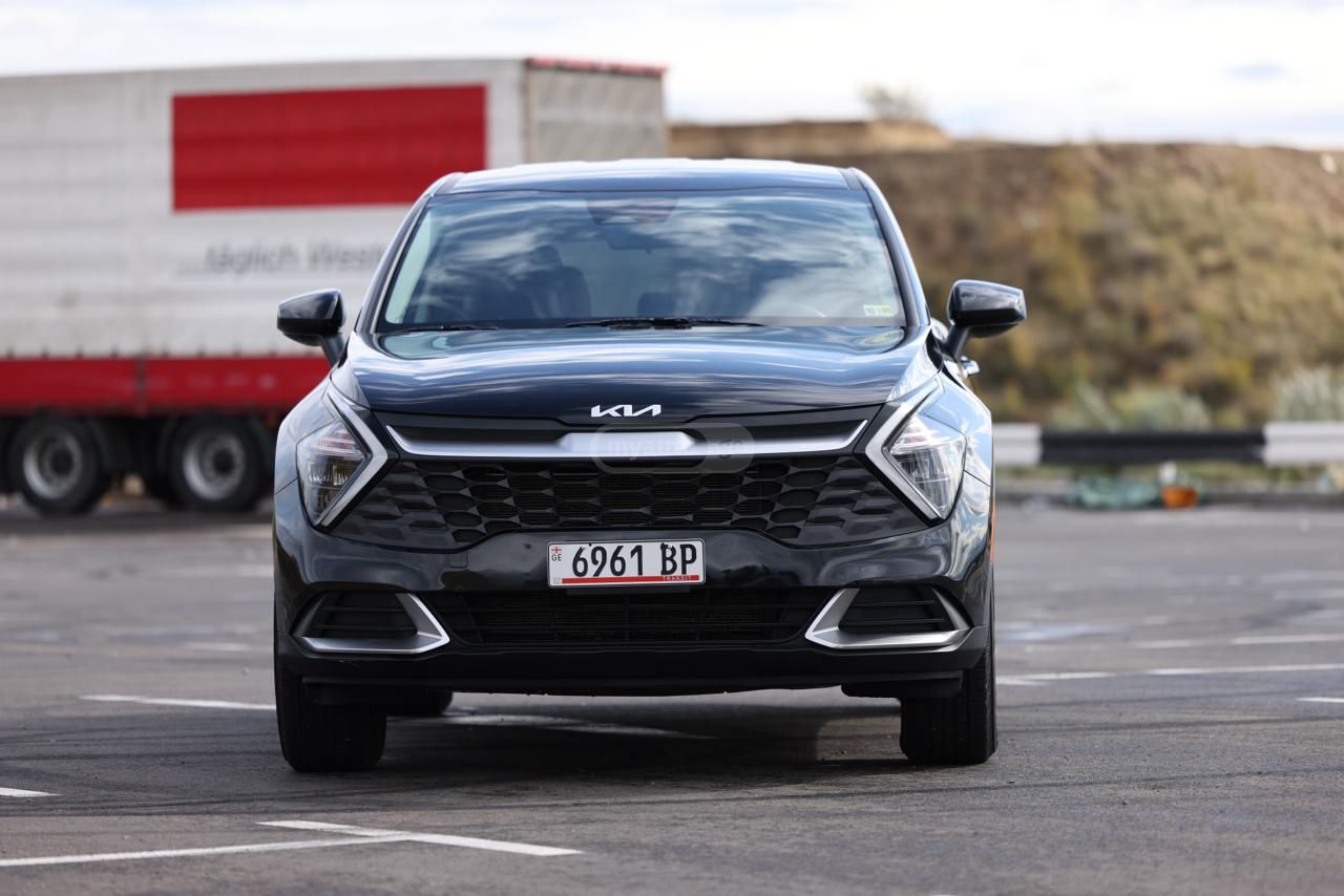Kia Sportage - фото 1