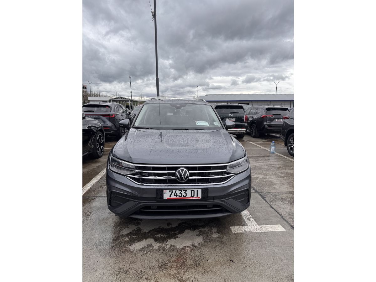Volkswagen Tiguan - фото 1