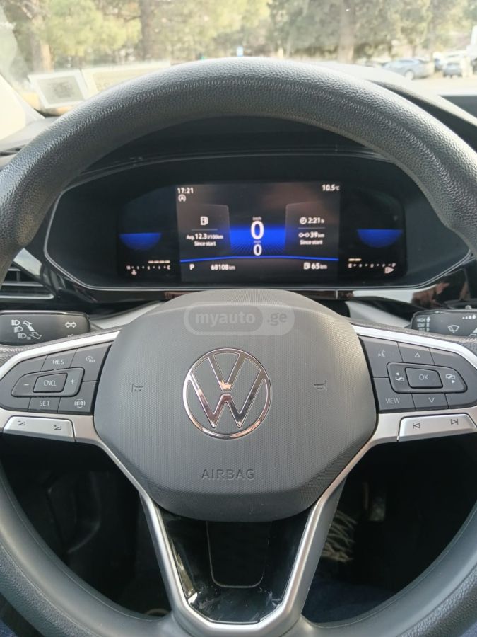 Volkswagen Taos - фото 13