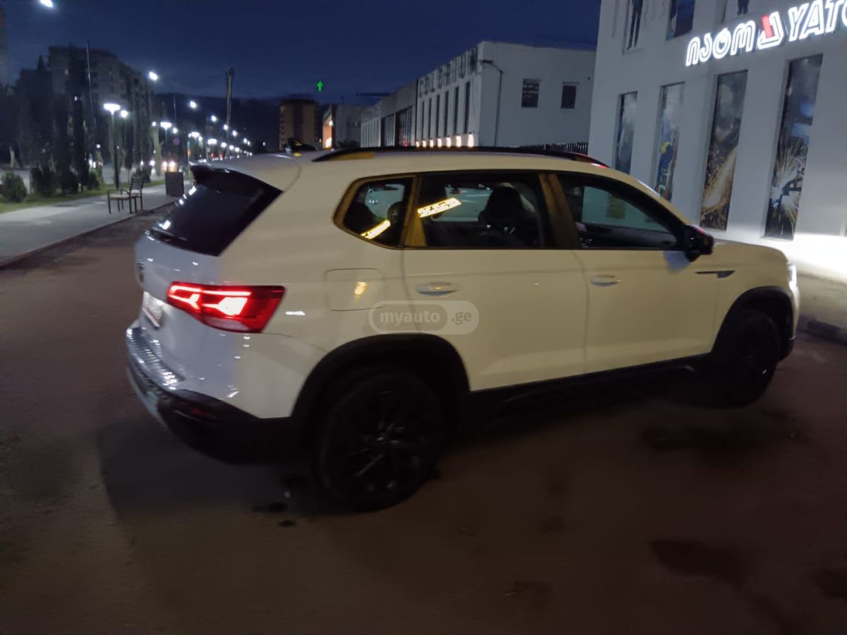 Volkswagen Taos - фото 7