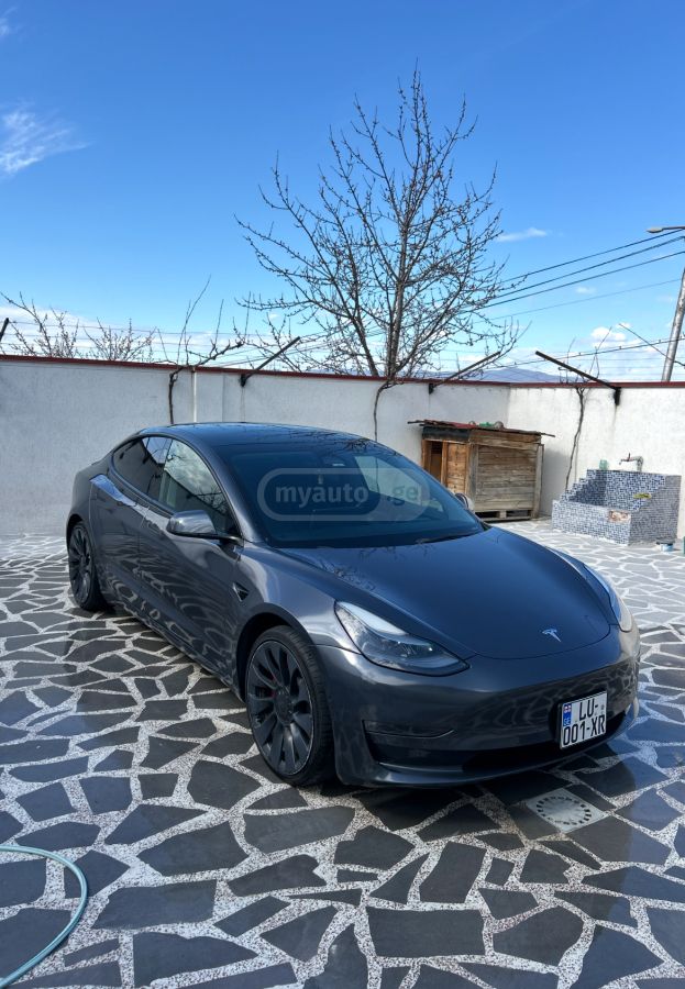 Tesla Model 3 - фото 7