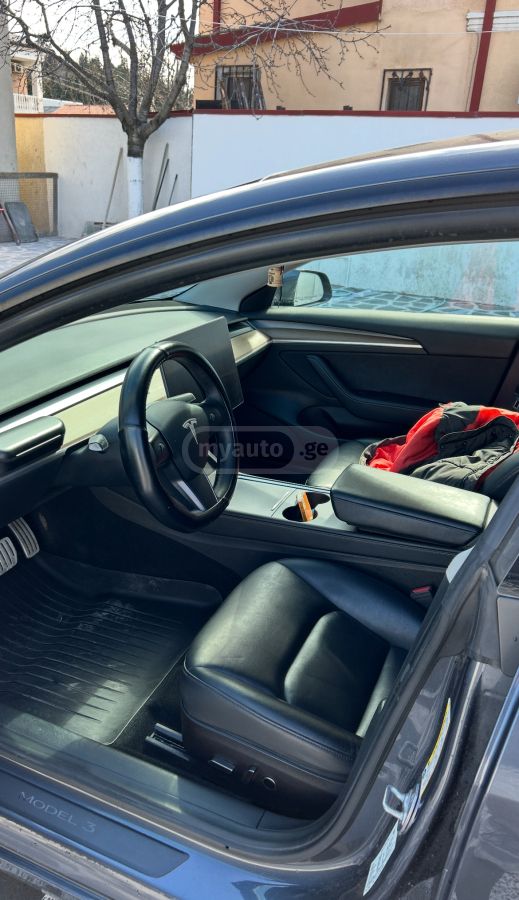 Tesla Model 3 - фото 8
