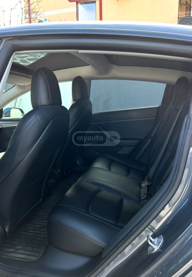 Tesla Model 3 - фото 9