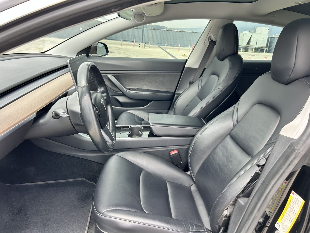 Tesla Model 3 - фото 10