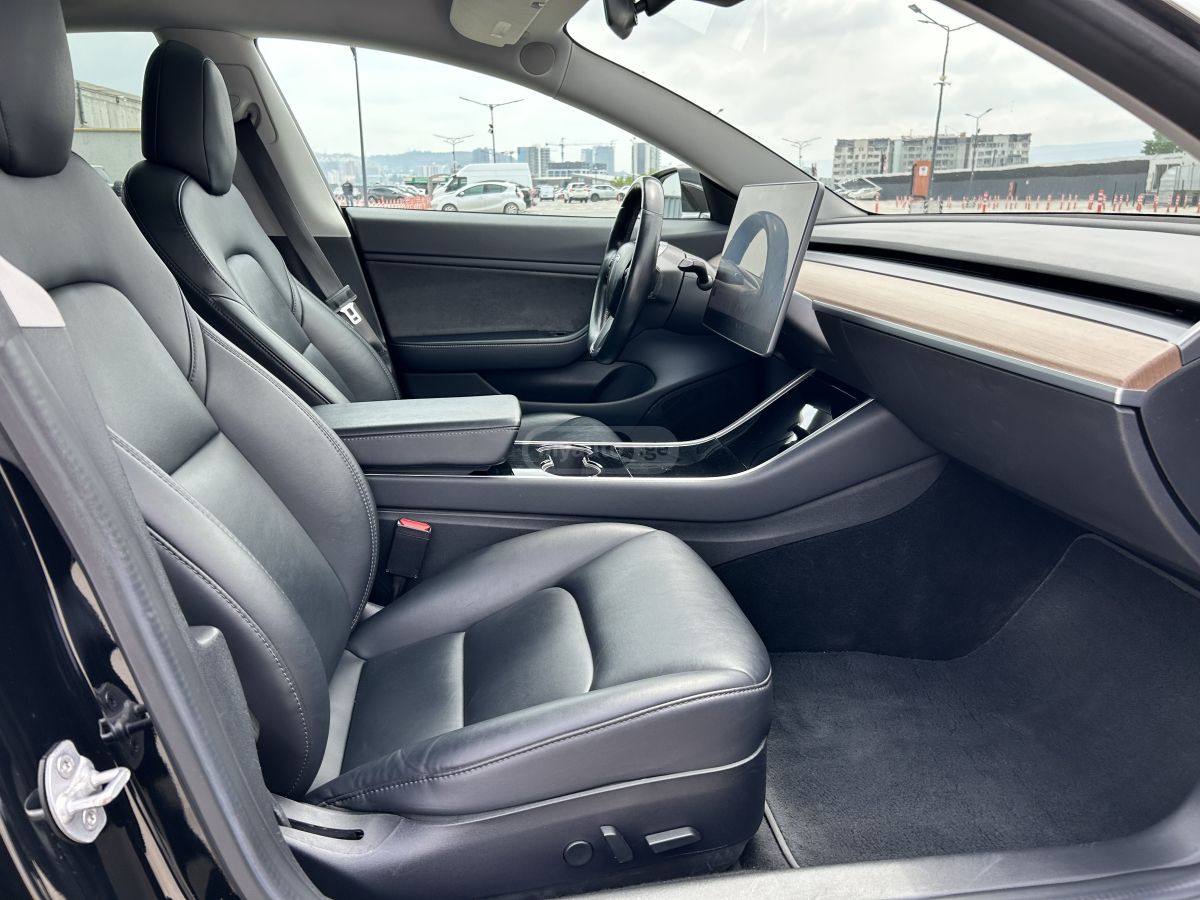 Tesla Model 3 - фото 11