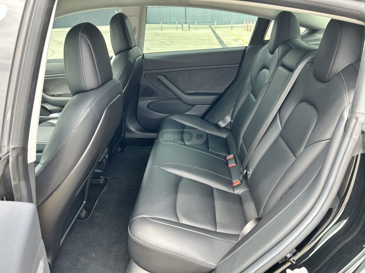 Tesla Model 3 - фото 9