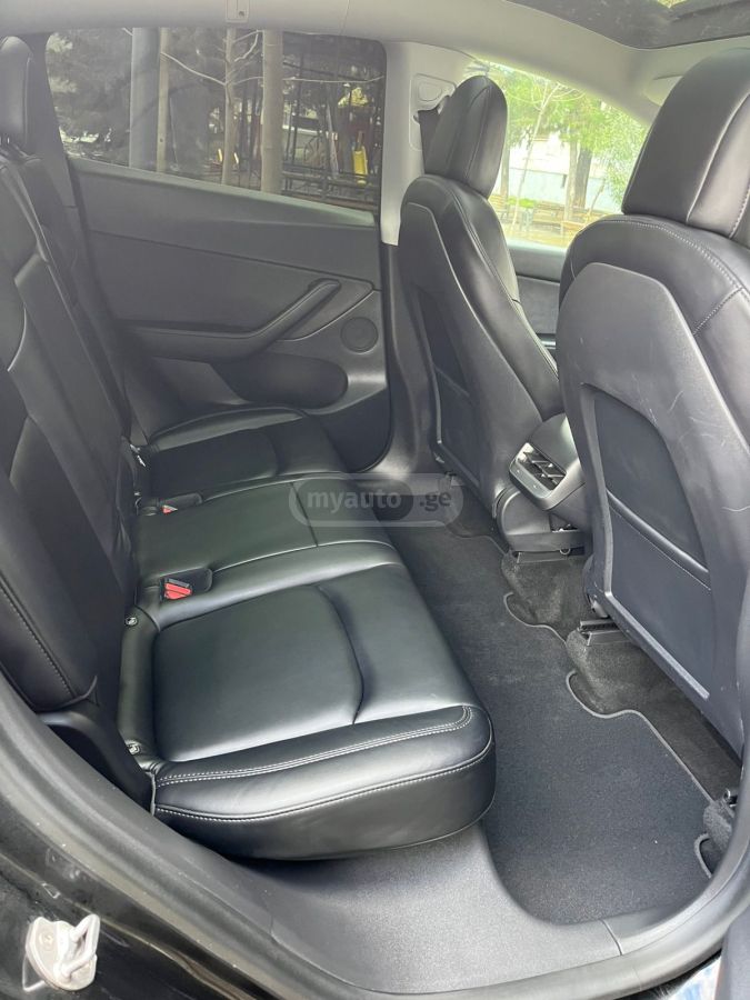 Tesla Model Y - фото 13