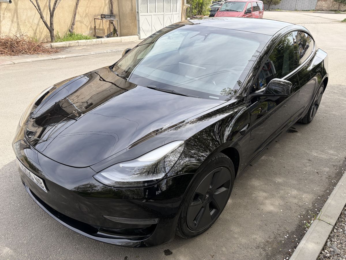 Tesla Model 3 - фото 1