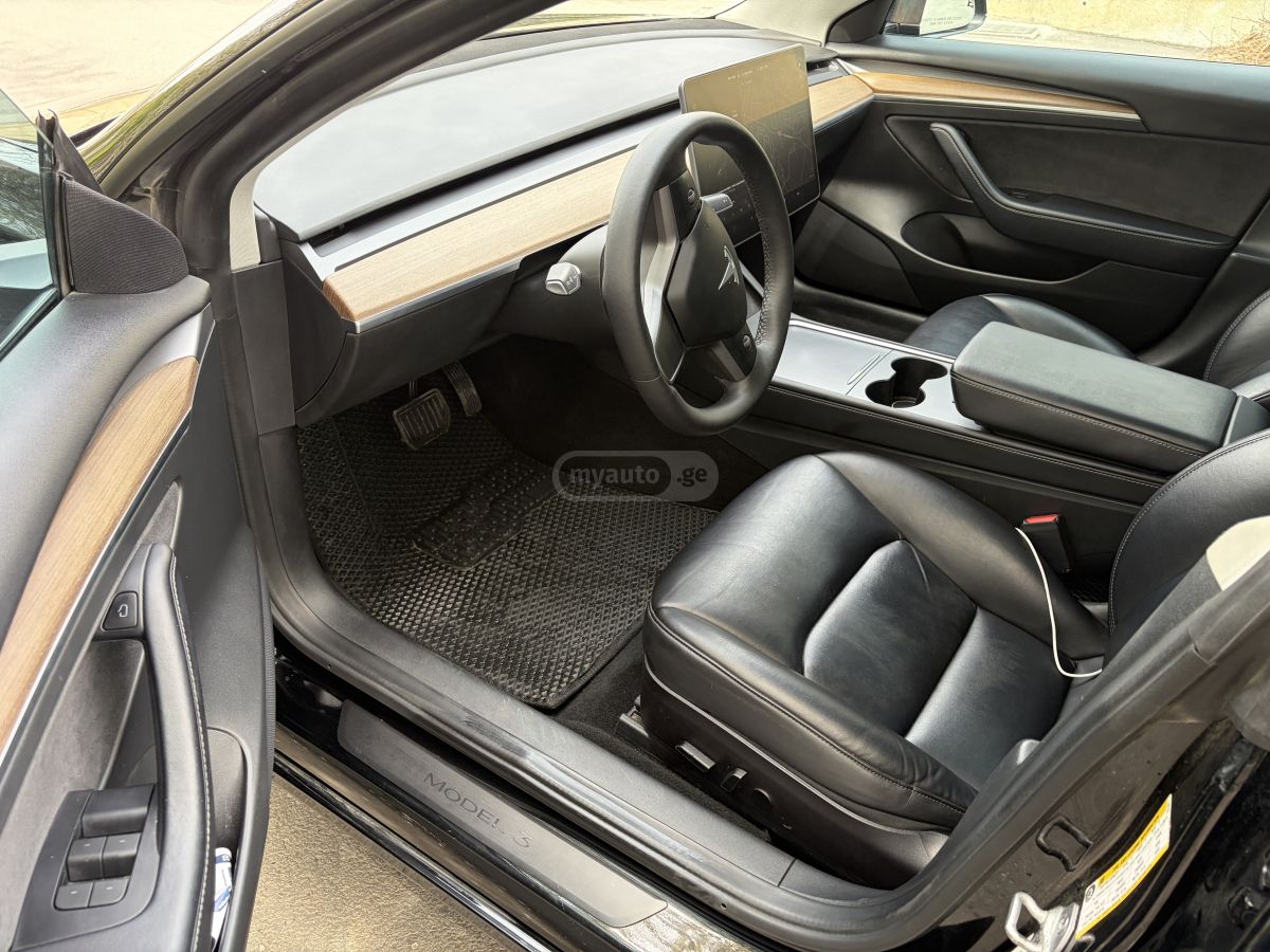 Tesla Model 3 - фото 10