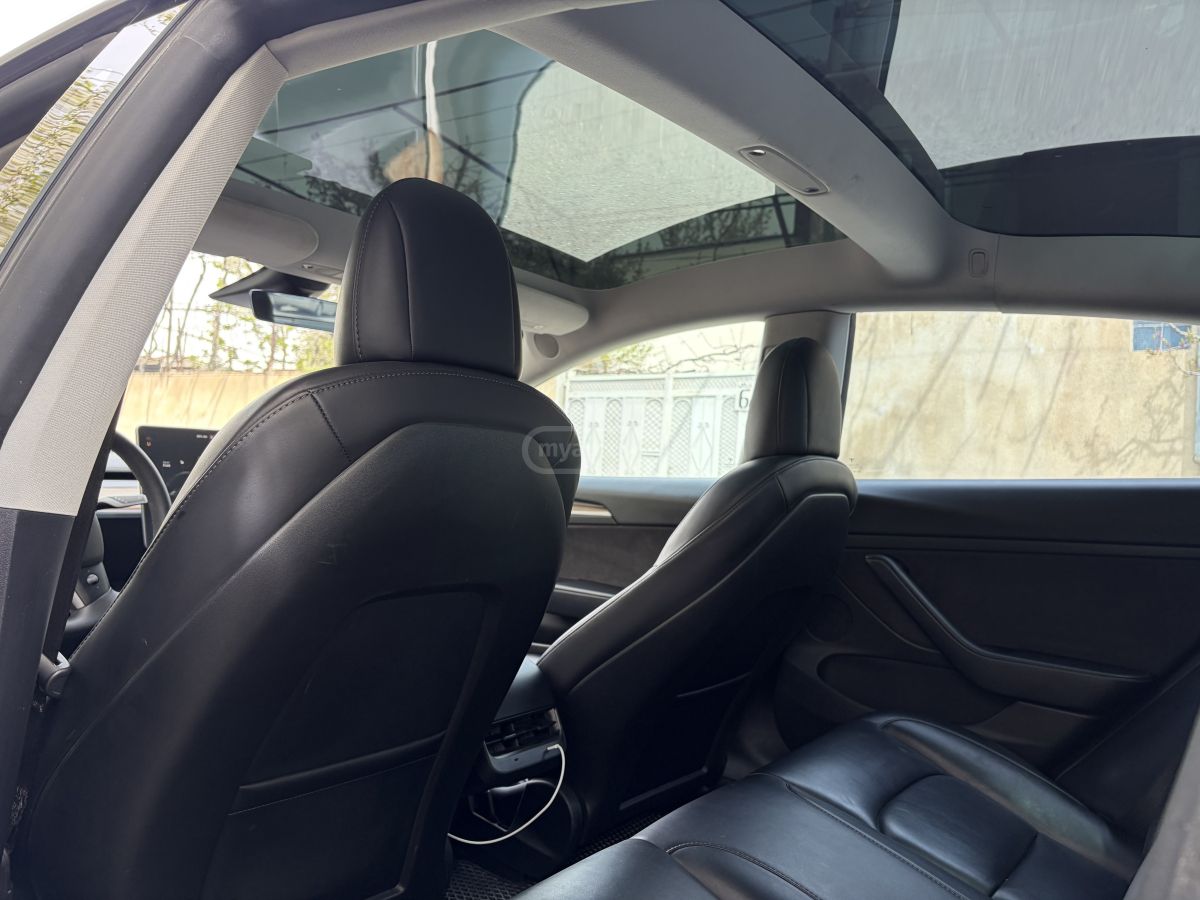Tesla Model 3 - фото 12