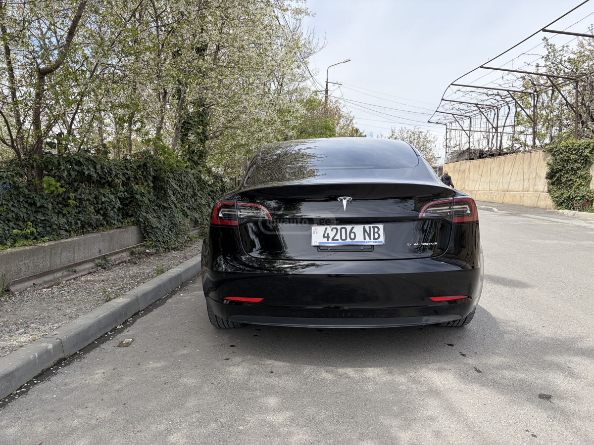 Tesla Model 3 - фото 5