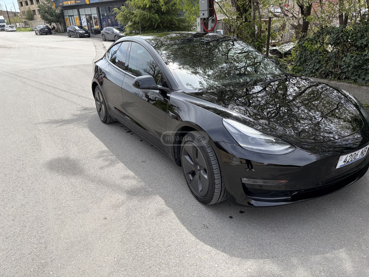 Tesla Model 3 - фото 8