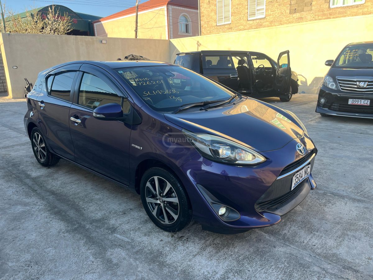 Toyota Aqua - фото 1