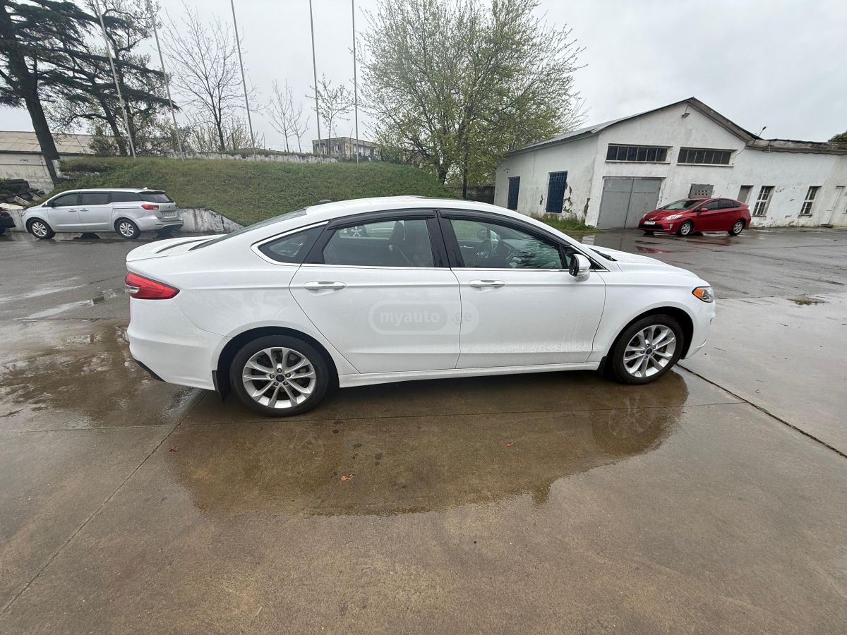 Ford Fusion - фото 10