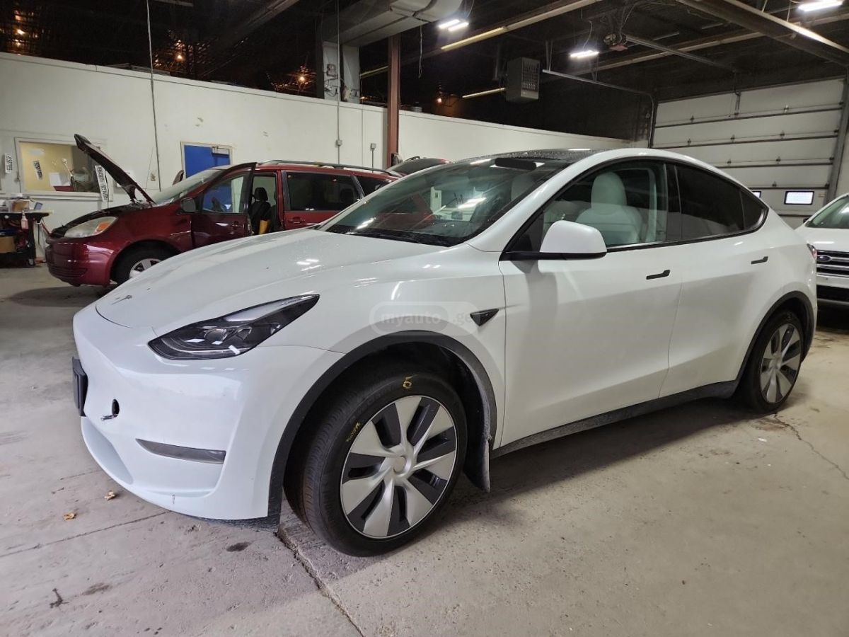 Tesla Model Y - фото 1