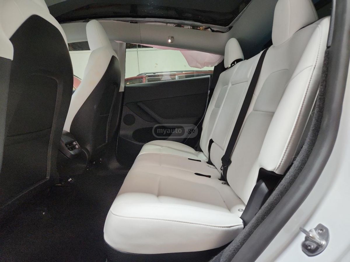 Tesla Model Y - фото 8