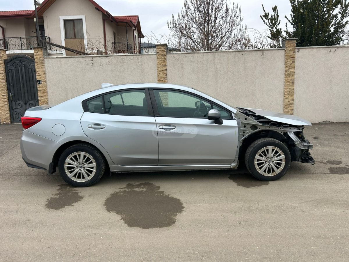 Subaru Impreza - фото 7