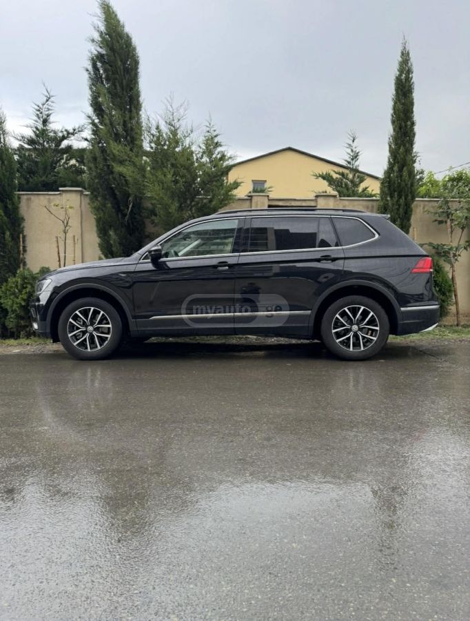 Volkswagen Tiguan - фото 1