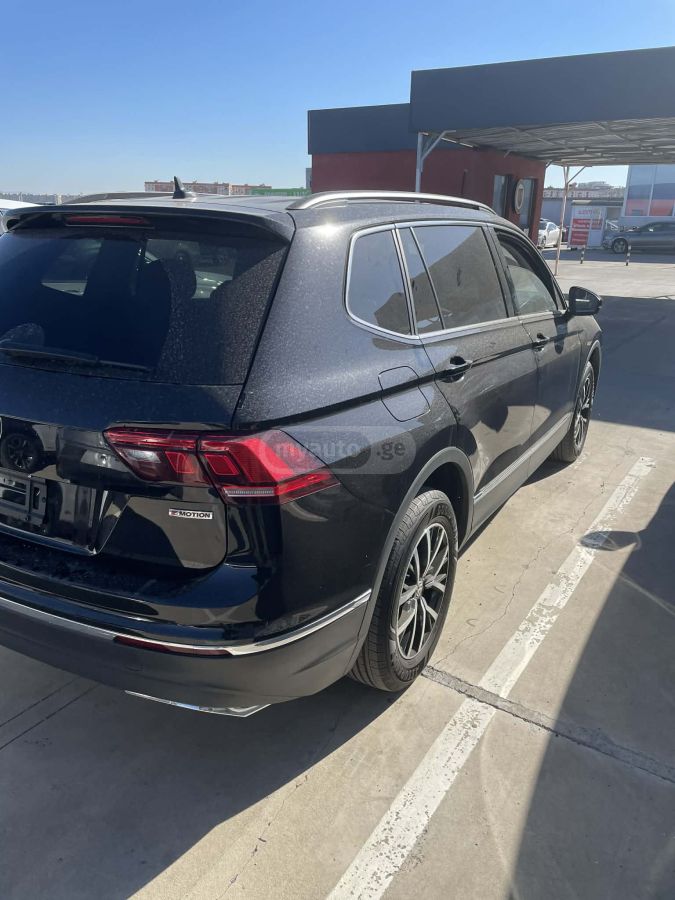 Volkswagen Tiguan - фото 14