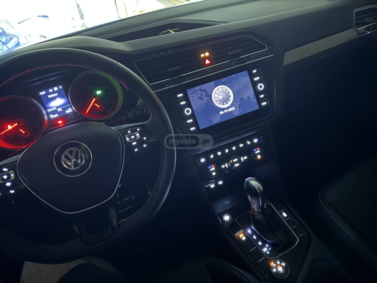 Volkswagen Tiguan - фото 6