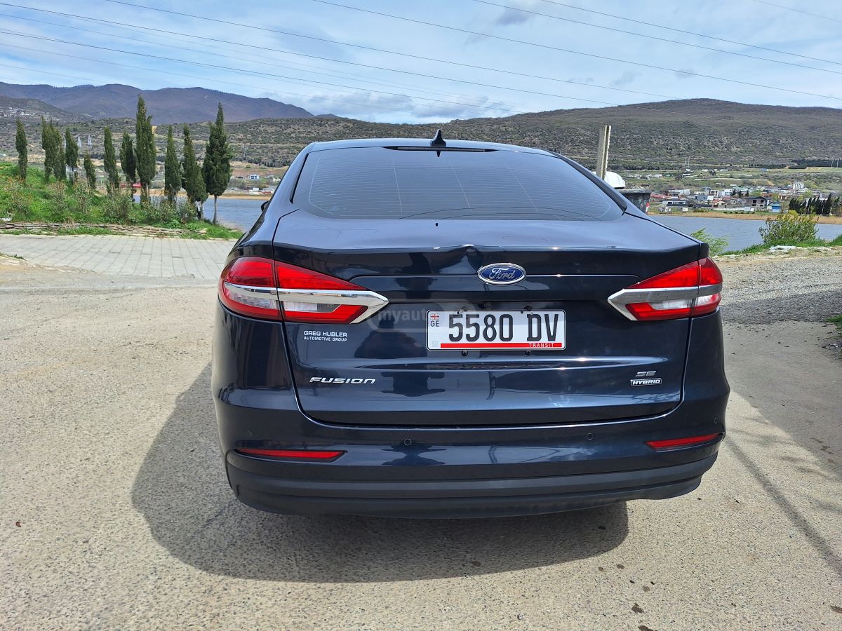 Ford Fusion - фото 10