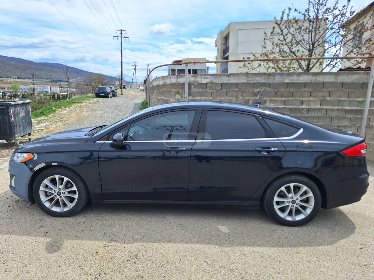 Ford Fusion - фото 12