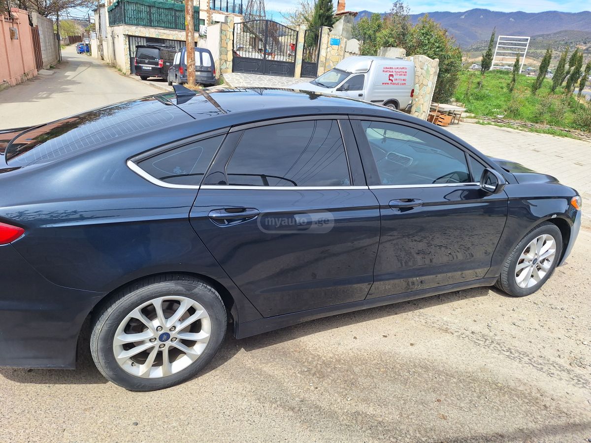 Ford Fusion - фото 9