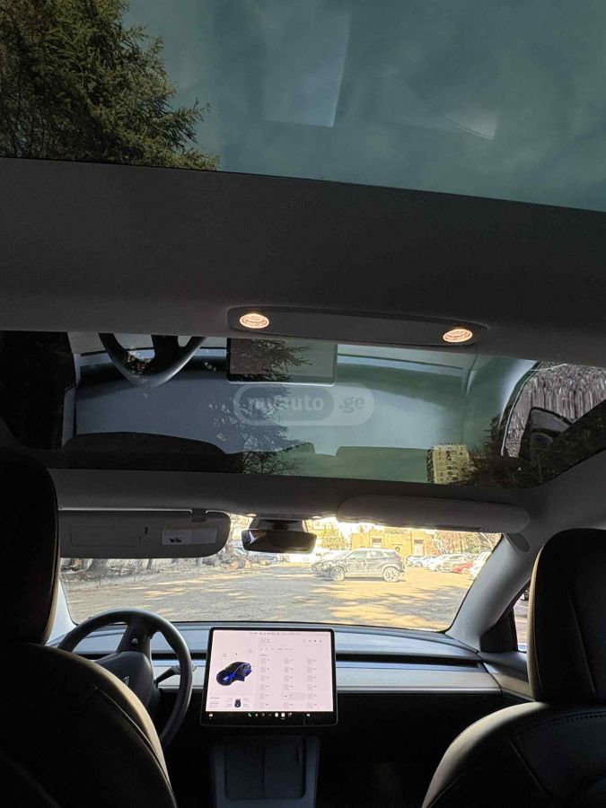 Tesla Model 3 - фото 10