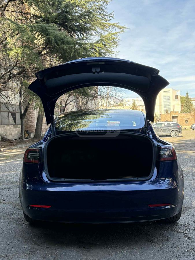 Tesla Model 3 - фото 12