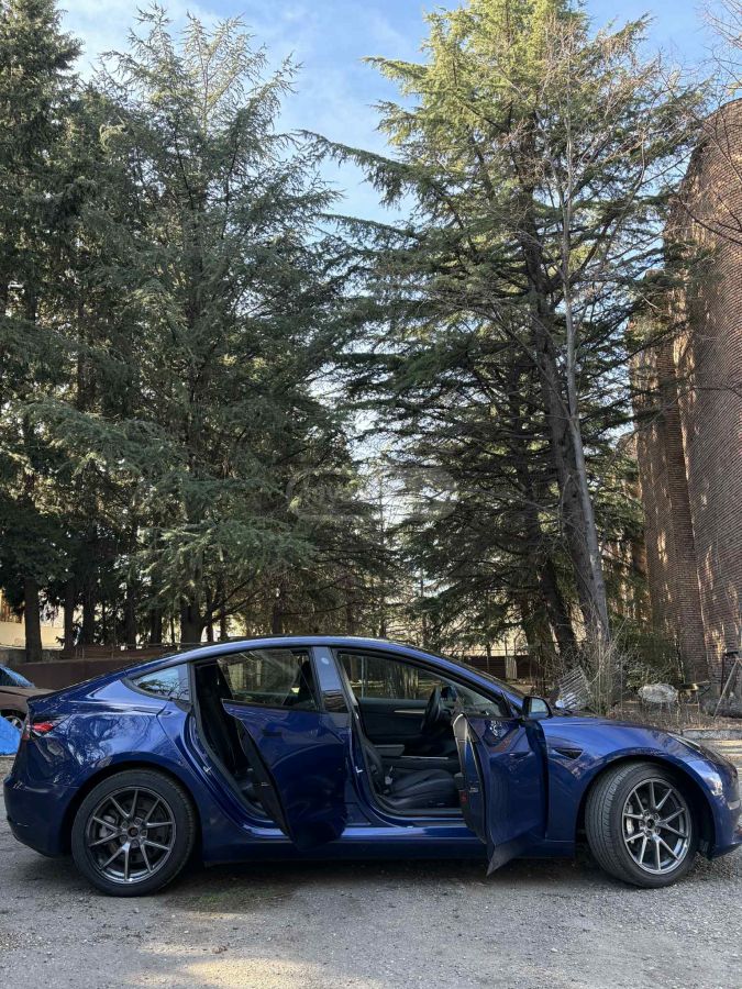 Tesla Model 3 - фото 13