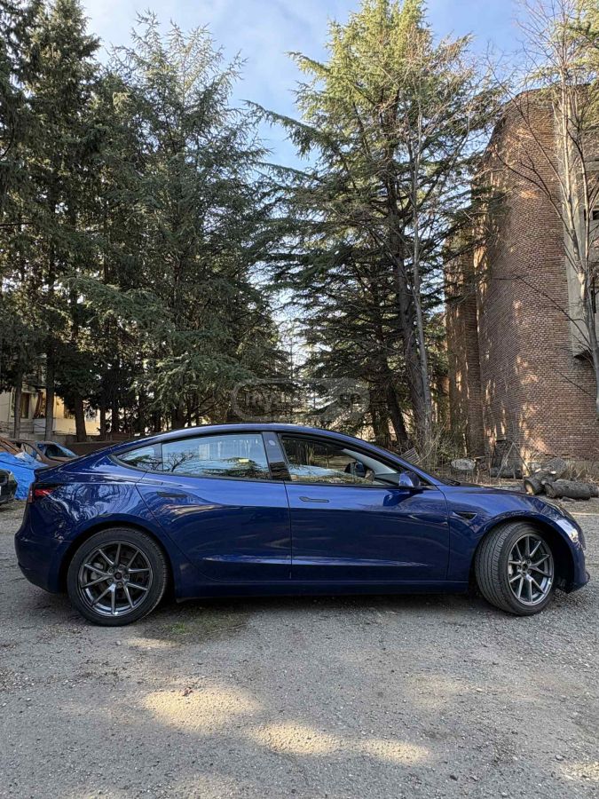 Tesla Model 3 - фото 7