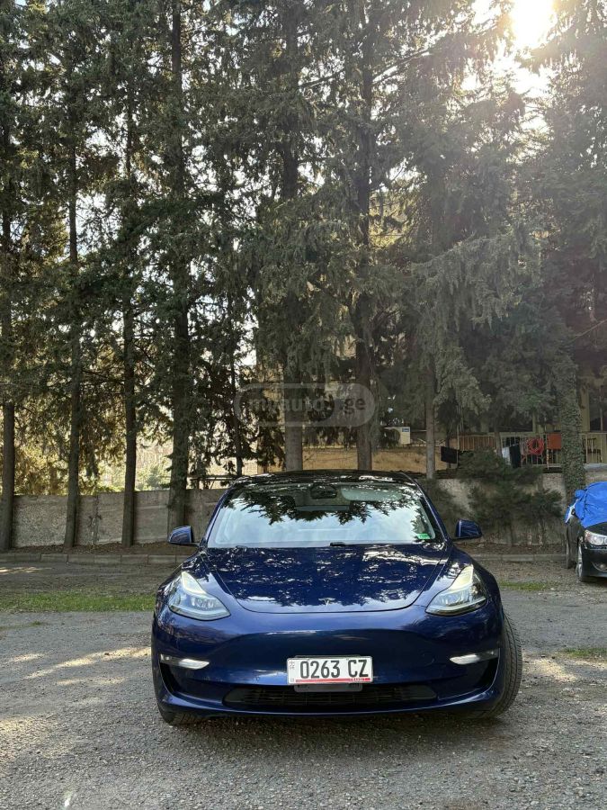 Tesla Model 3 - фото 9