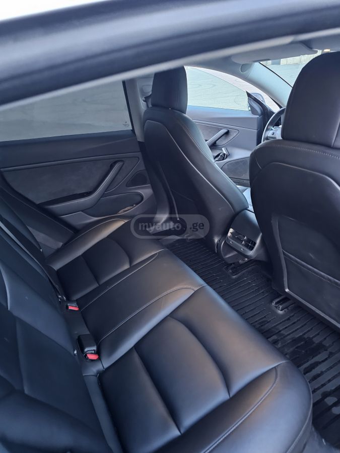 Tesla Model 3 - фото 7