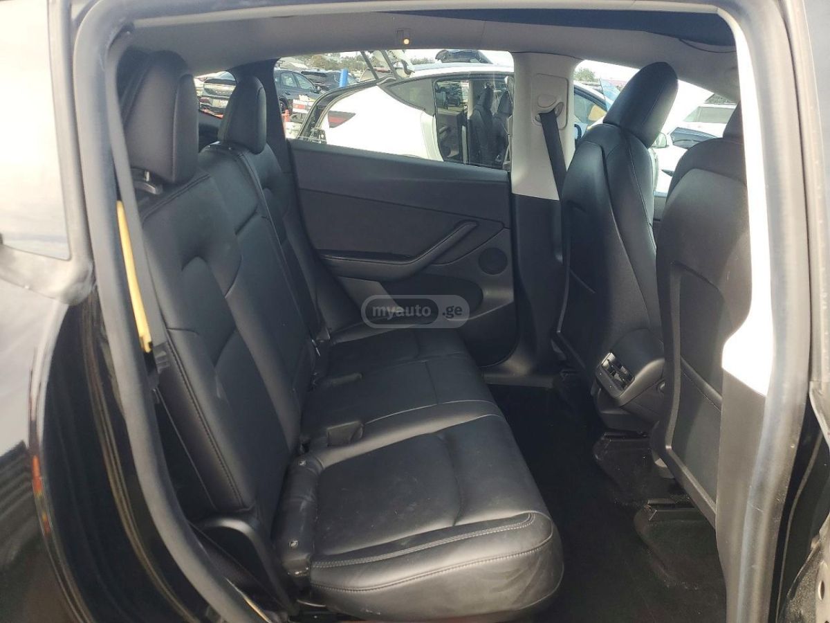Tesla Model Y - фото 10