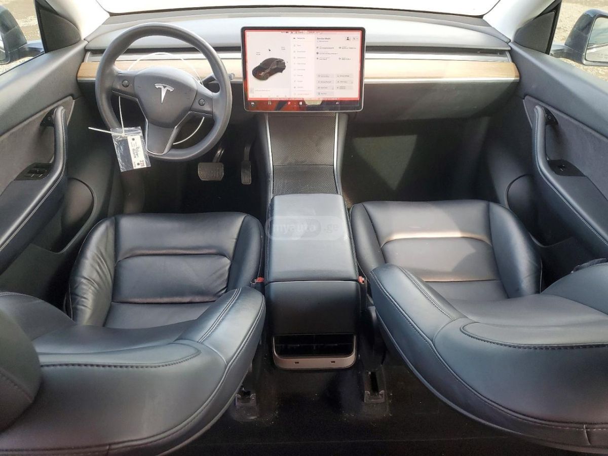 Tesla Model Y - фото 8