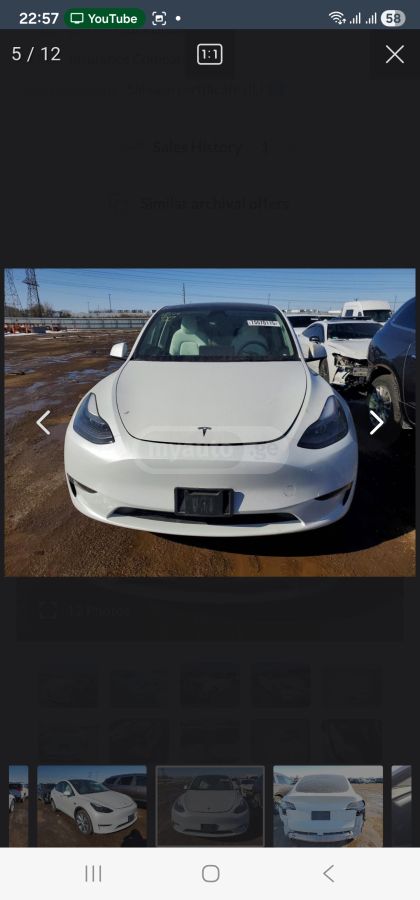Tesla Model Y - фото 1