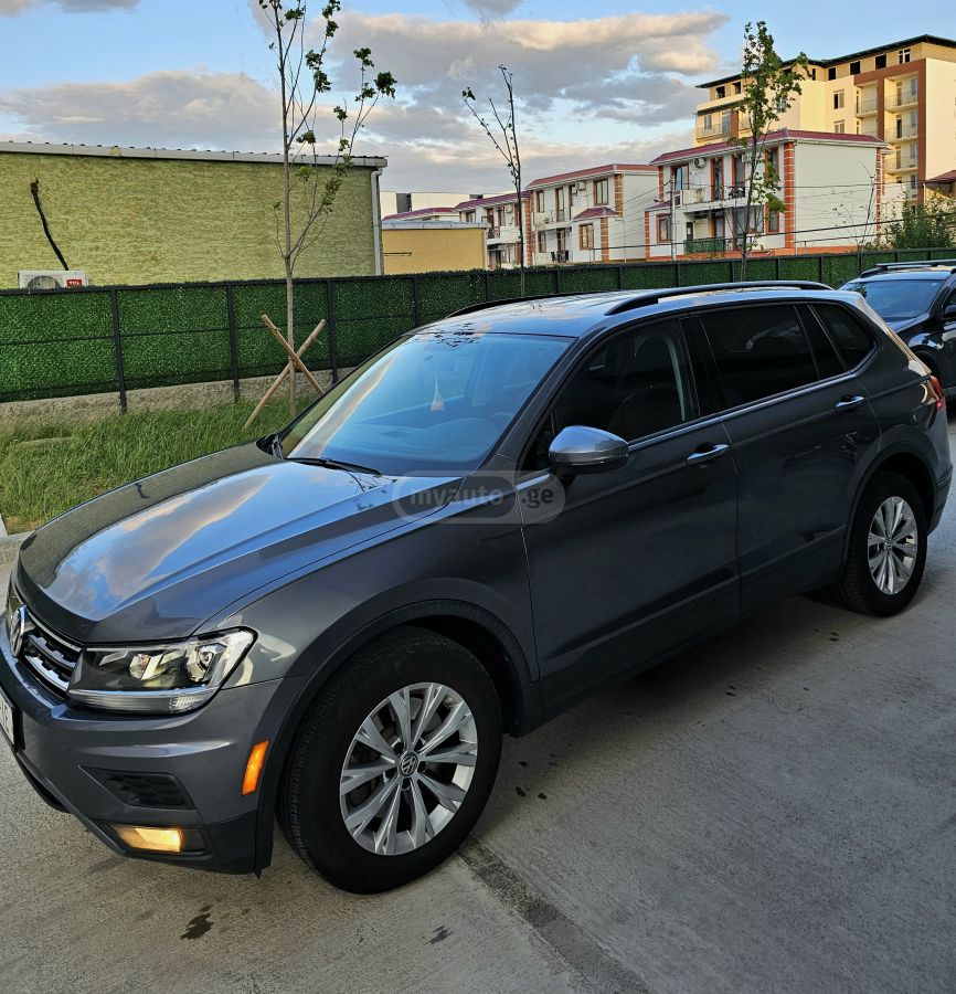 Volkswagen Tiguan - фото 11