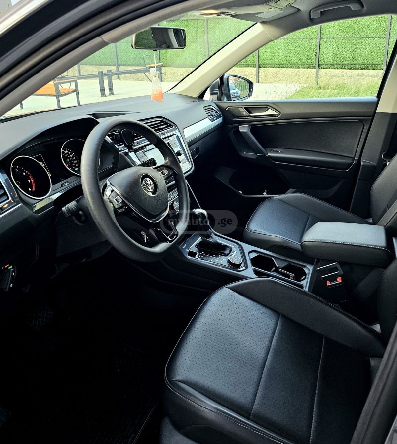 Volkswagen Tiguan - фото 6