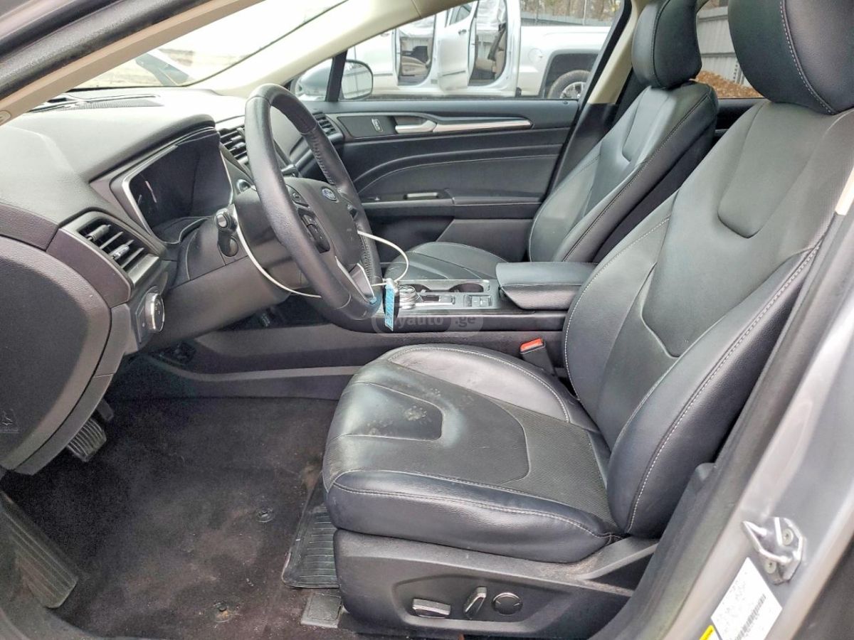 Ford Fusion - фото 7