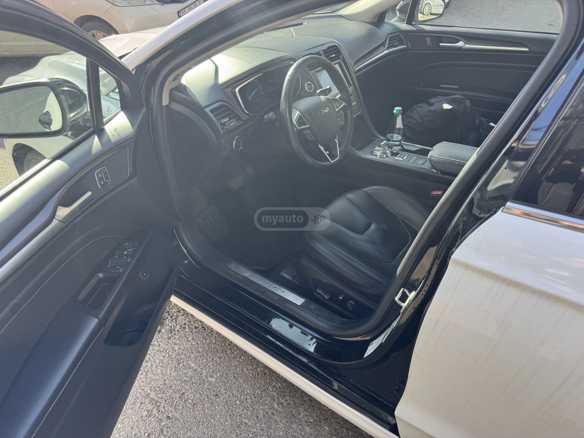 Ford Fusion - фото 7