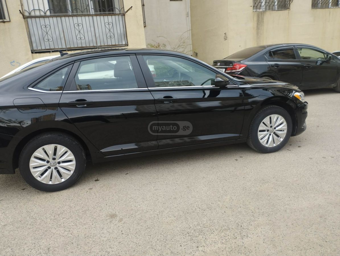 Volkswagen Jetta - фото 7