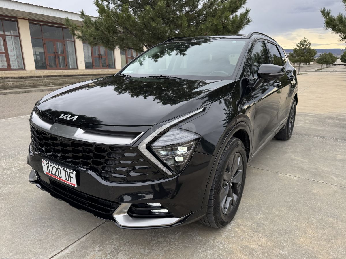 Kia Sportage - фото 1