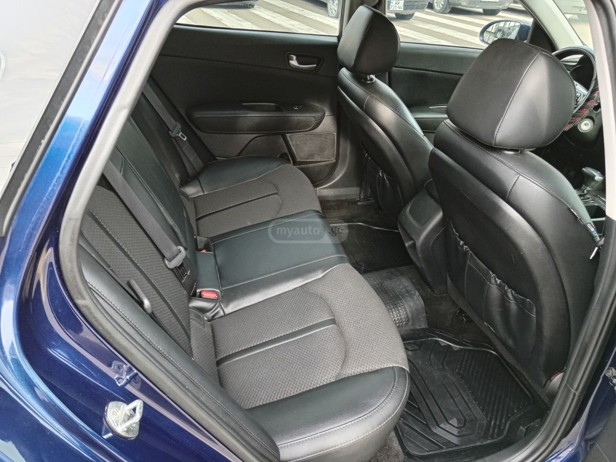 Kia Optima - фото 10