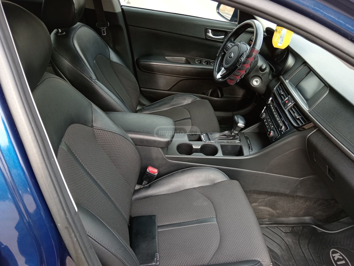 Kia Optima - фото 11