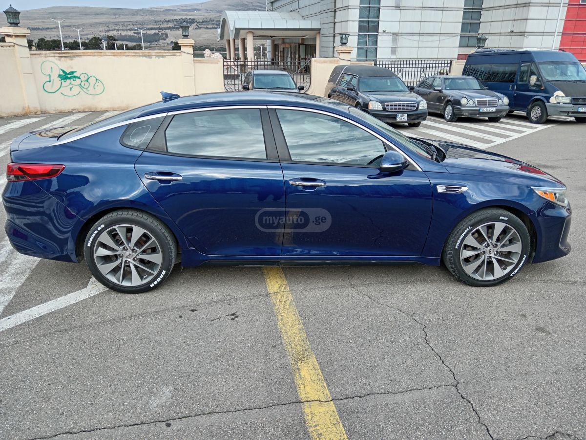 Kia Optima - фото 4