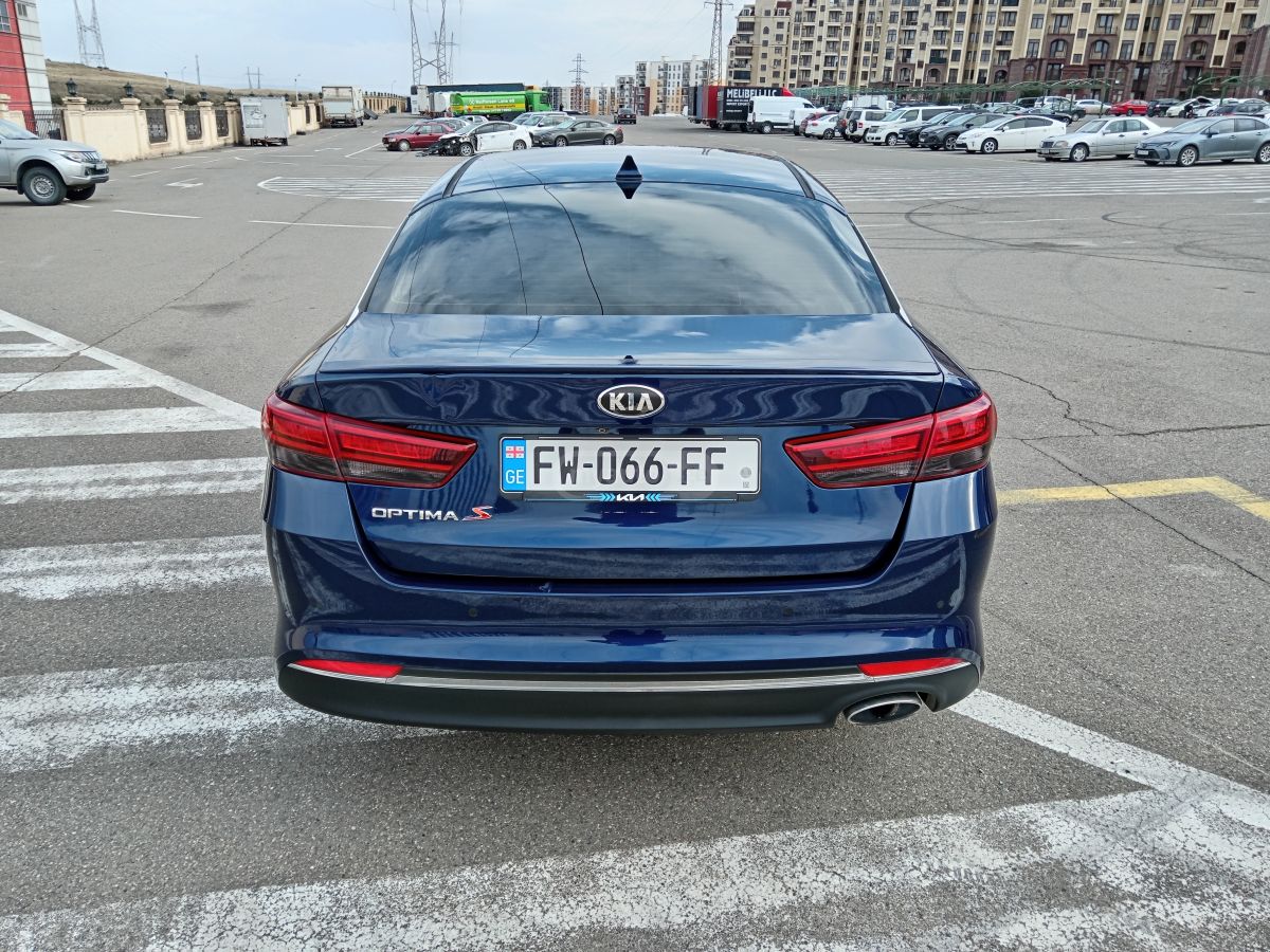 Kia Optima - фото 5