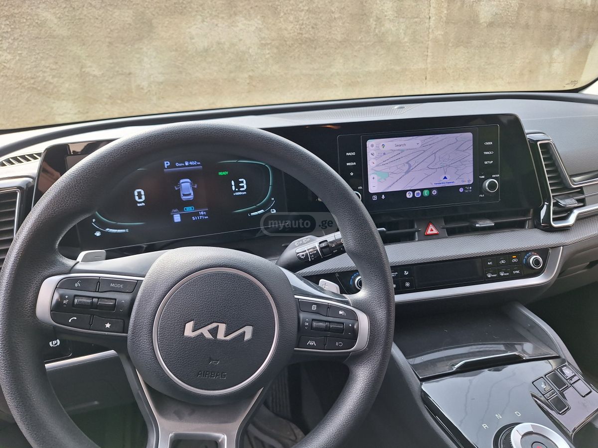 Kia Sportage - фото 11