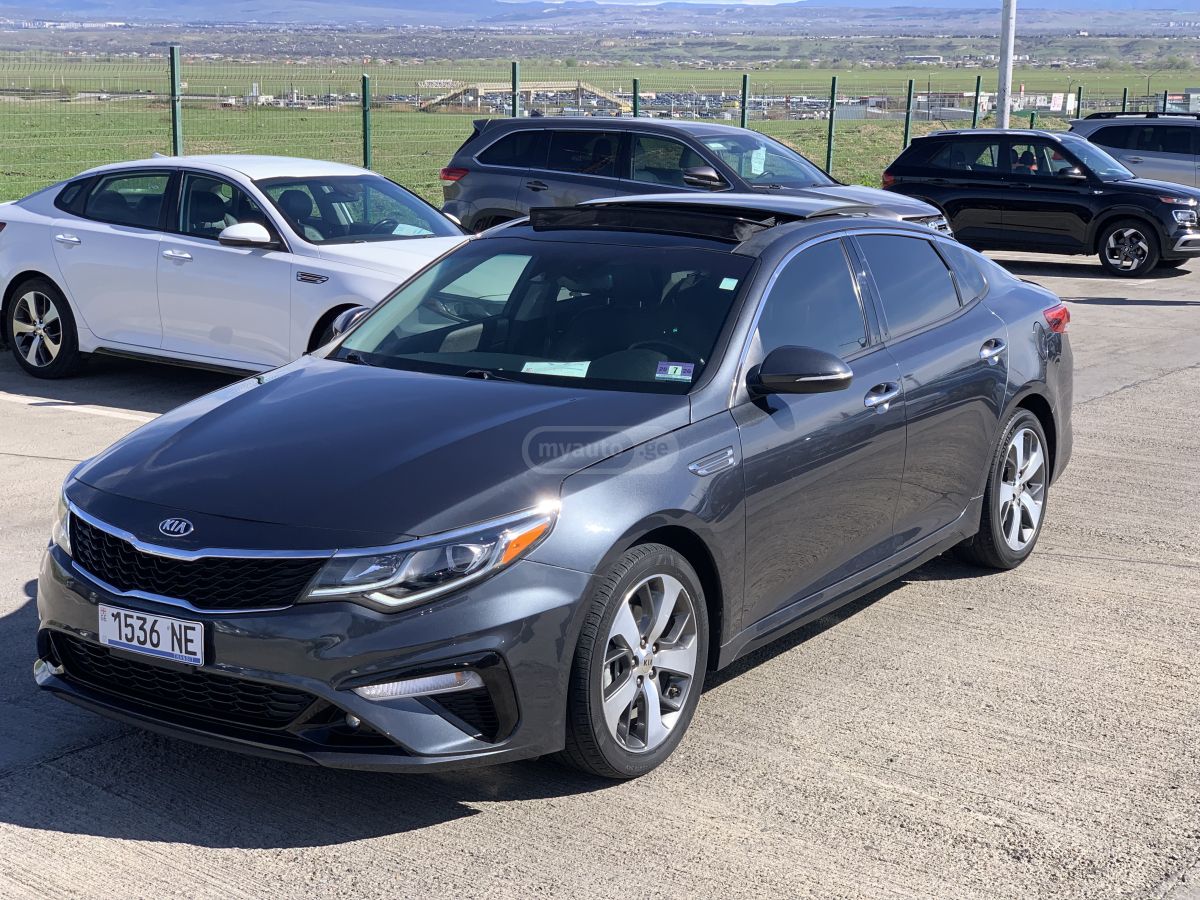 Kia Optima - фото 1