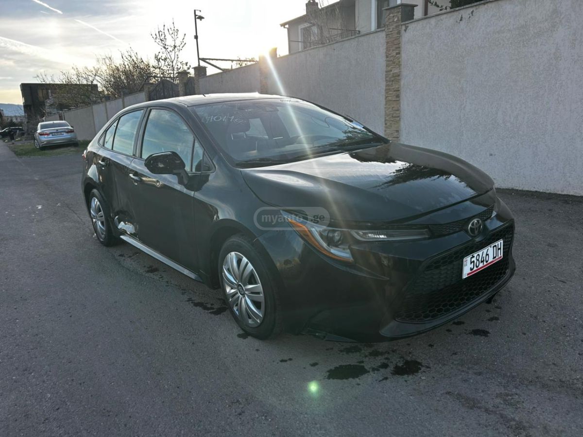 Toyota Corolla - фото 2